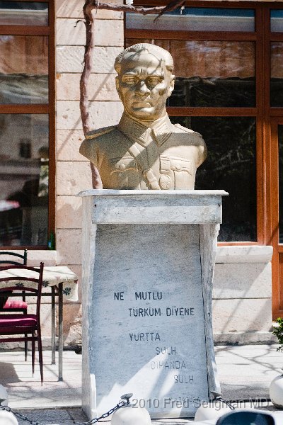 20100406_114408 D300.jpg - Monument in Mustapafasa with bust of Attaturk, founder of modern Turkey.  It has a famous Attaturk saying. The translation of this famous line is:  "Proud is the man that can say ' I am a Turk'"